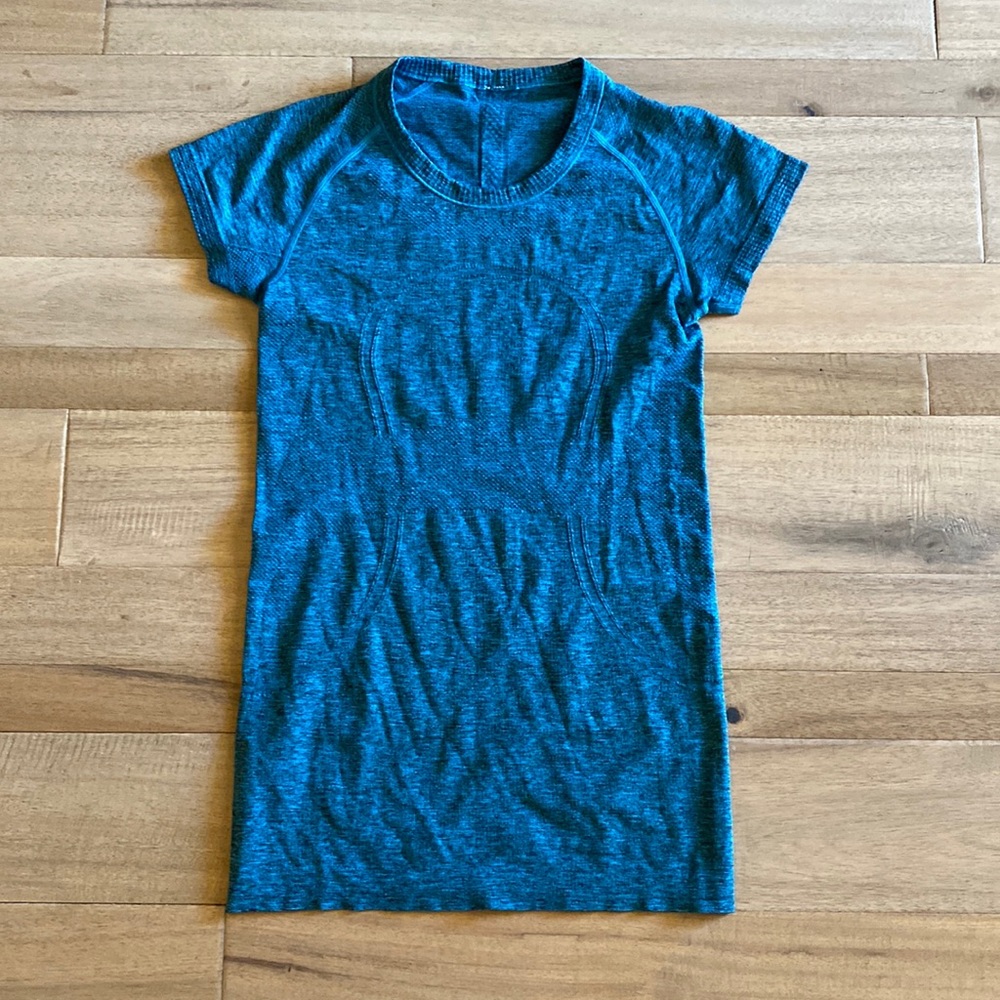 Size 6 swiftly tech shirt blue/black in color